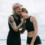 image of two people with tattoos