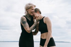image of two people with tattoos