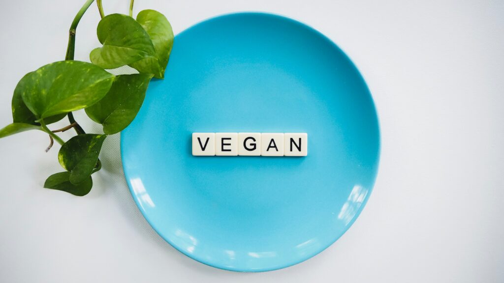 image of scrabble tiles spelling out the word vegan